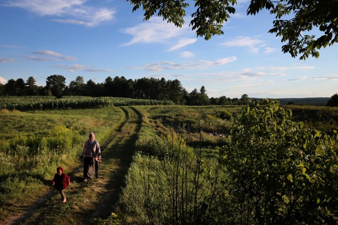 Gamana Yarow works one of 33 plots the Somalis are renting at the 118-acre Intervale Farm.